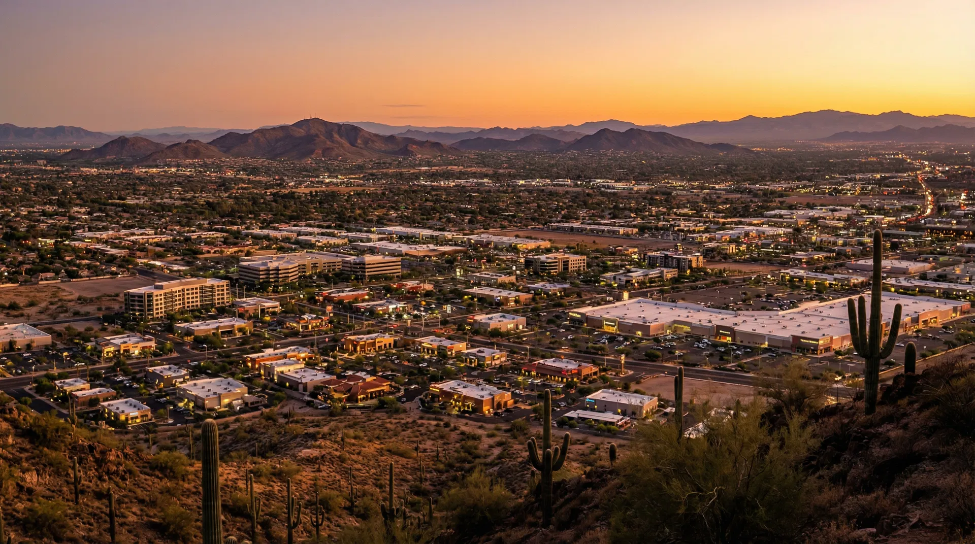 Aerial view of Phoenix Arizona metropolitan area at sunset showing the vast Maricopa County service area