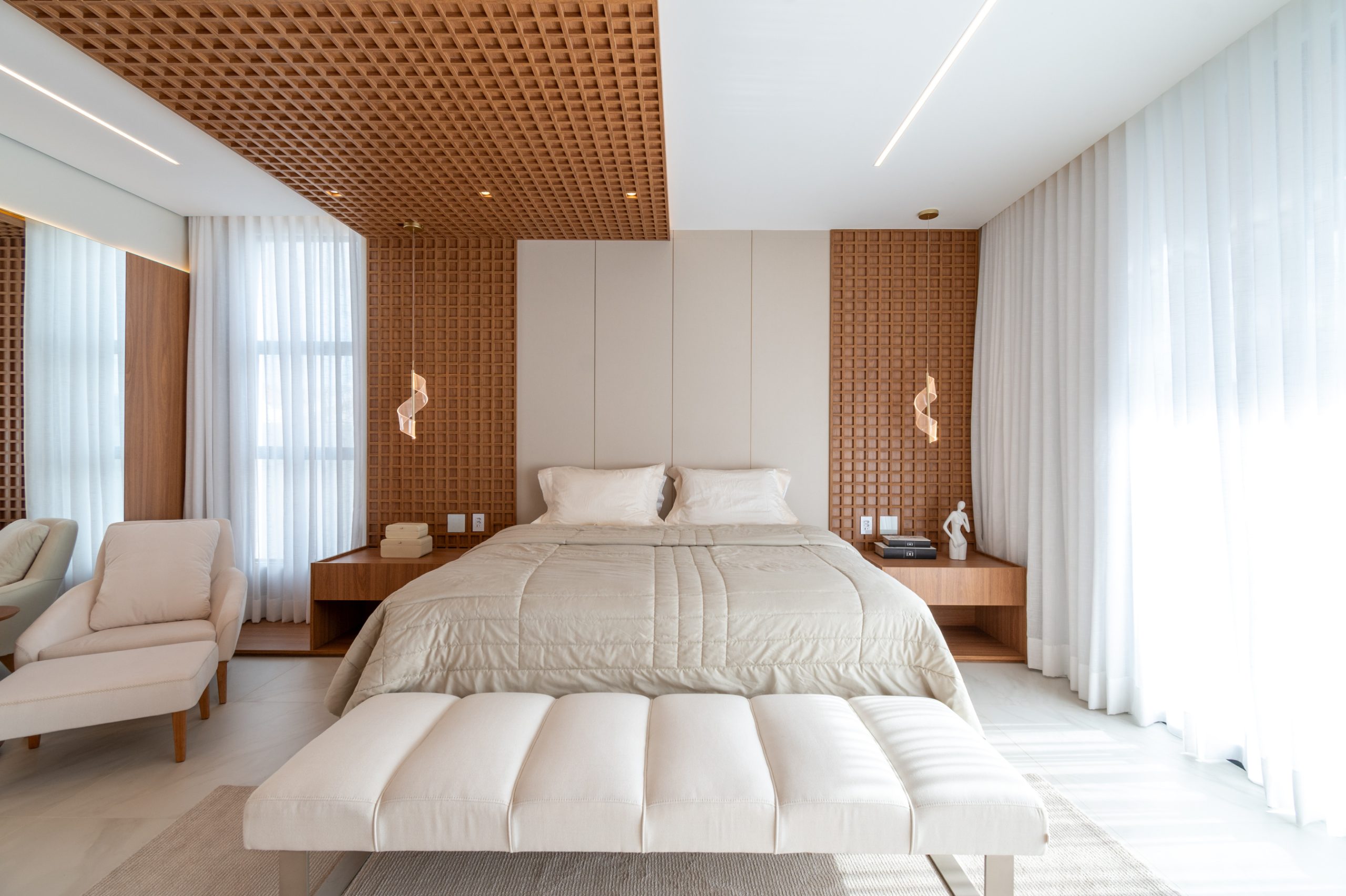 Quarto de casal moderno com iluminação sofisticada