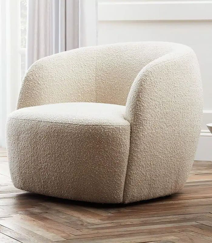 Poltrona bouclé em ambiente minimalista
