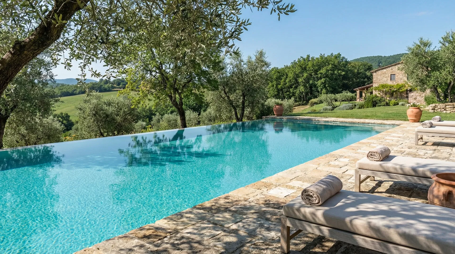 15-meter swimming pool surrounded by olive and almond trees