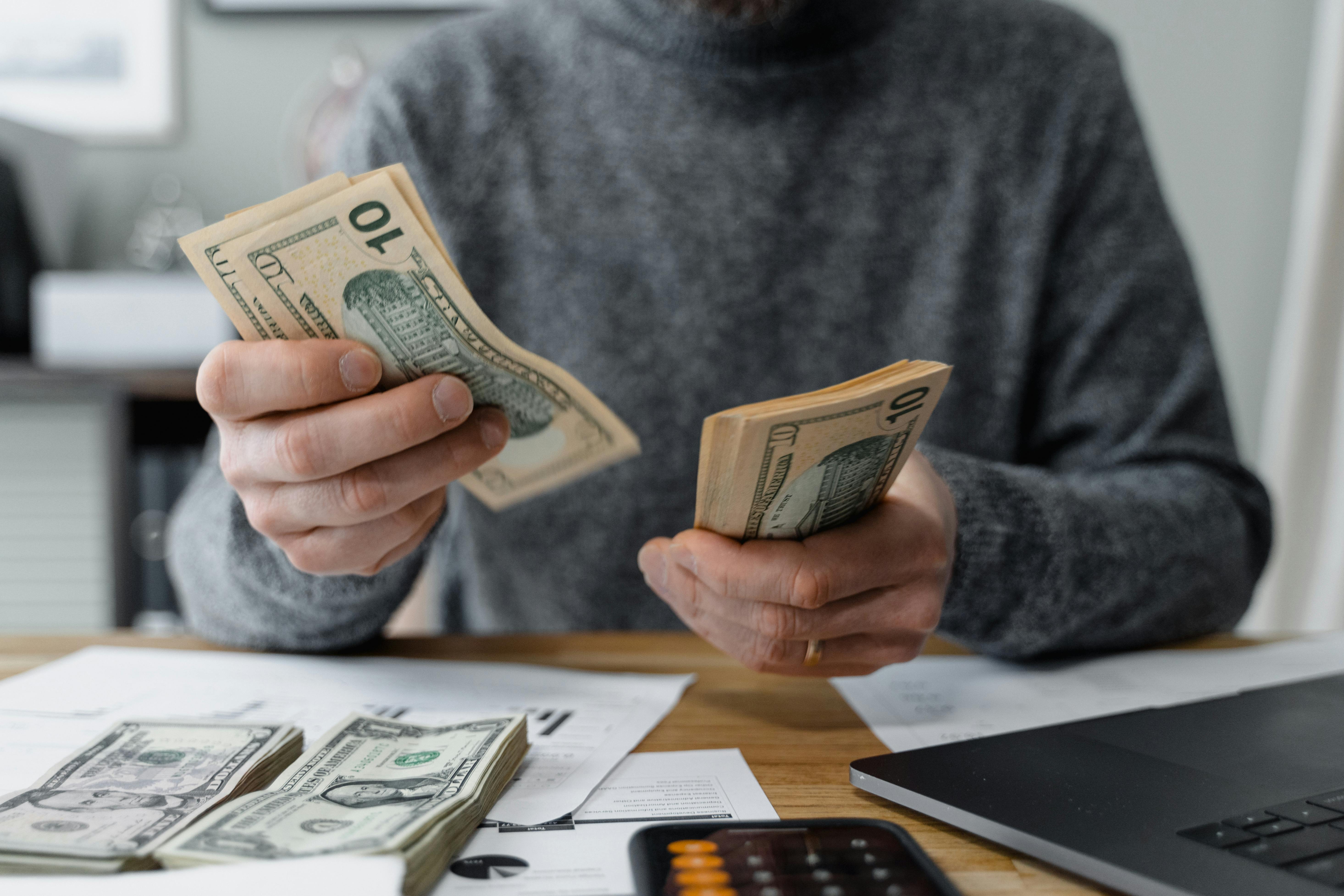 Person counting money
