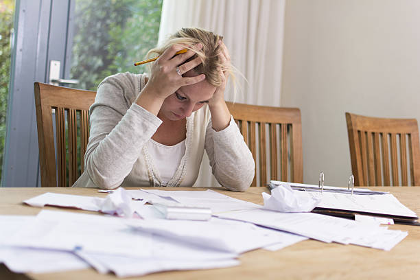 Person stressed about debt