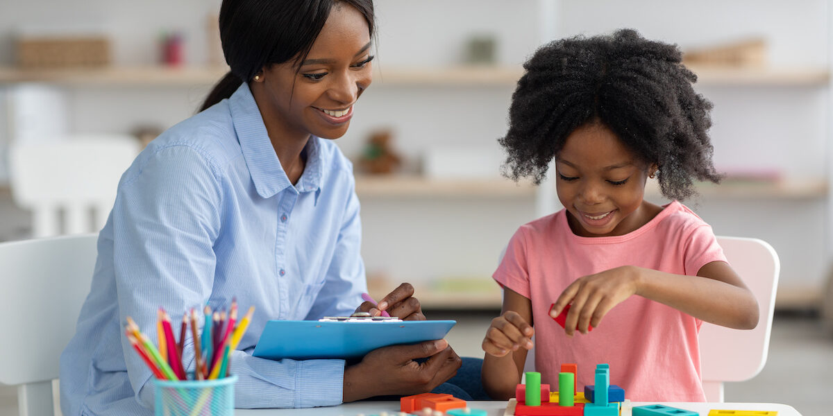 An ABA therapy session with a child and therapist.