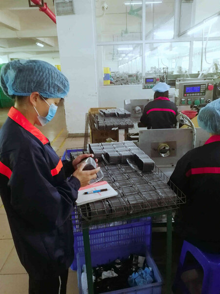 Image showing quality control testing of cotton swabs