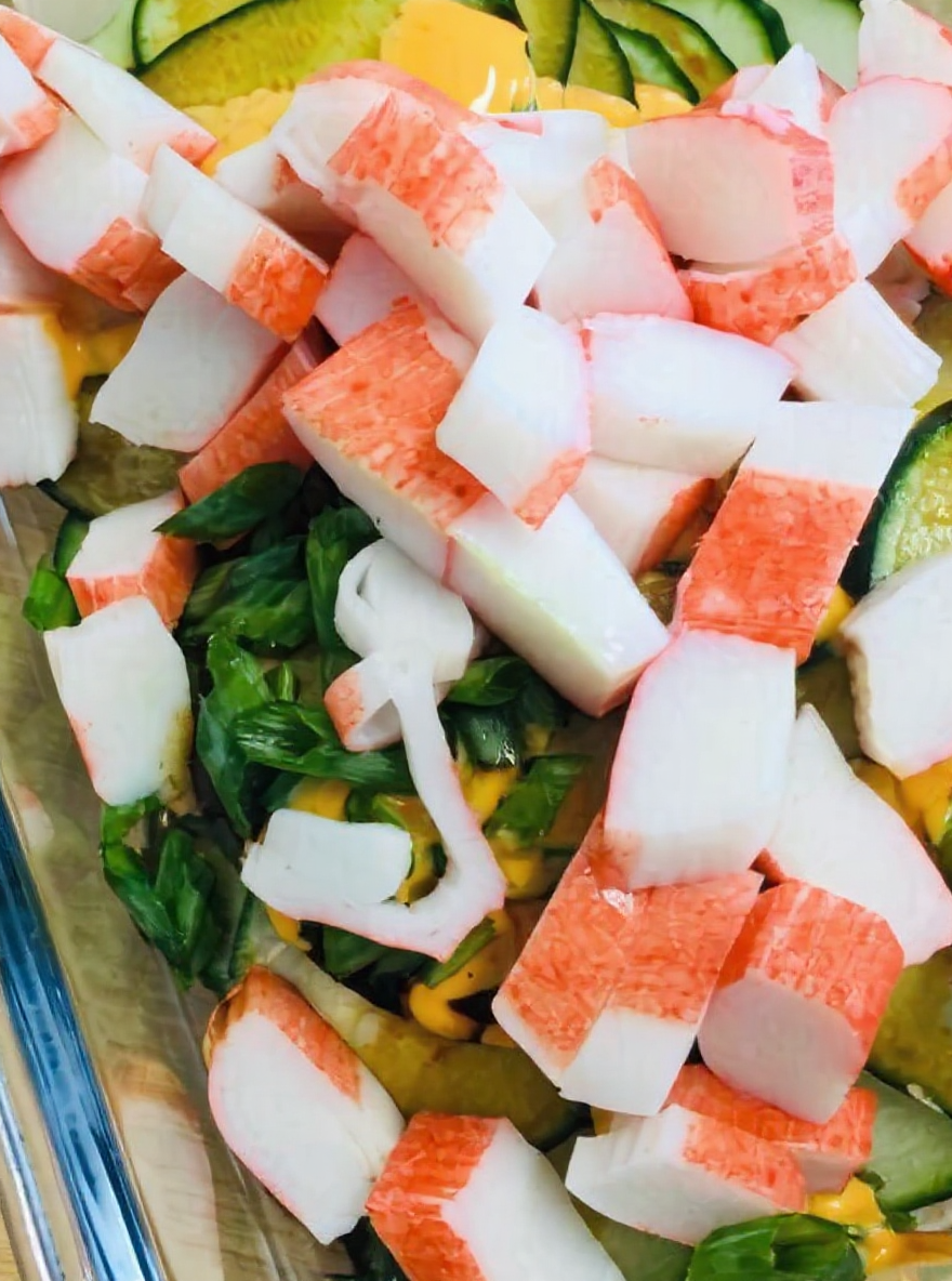 Mixed ingredients for California Roll Cucumber Salad