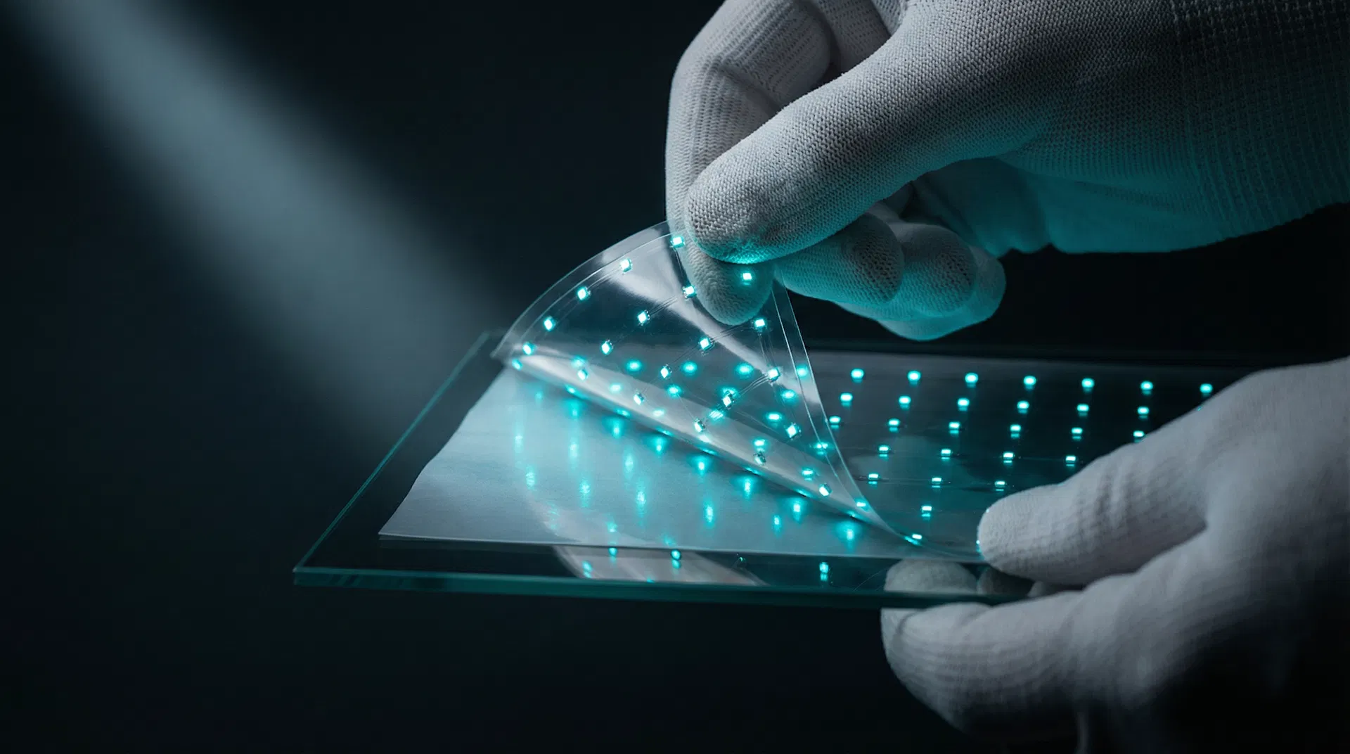 Transparent LED film closeup showing embedded LED nodes