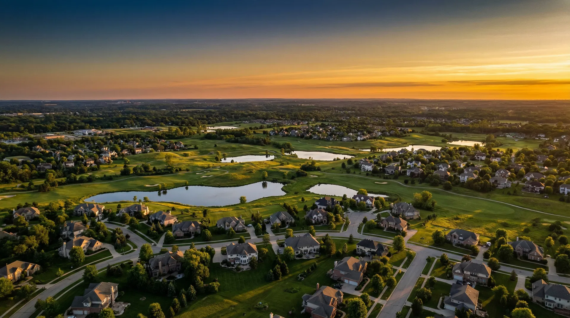 Aerial view of Oakland County Michigan neighborhoods at sunset