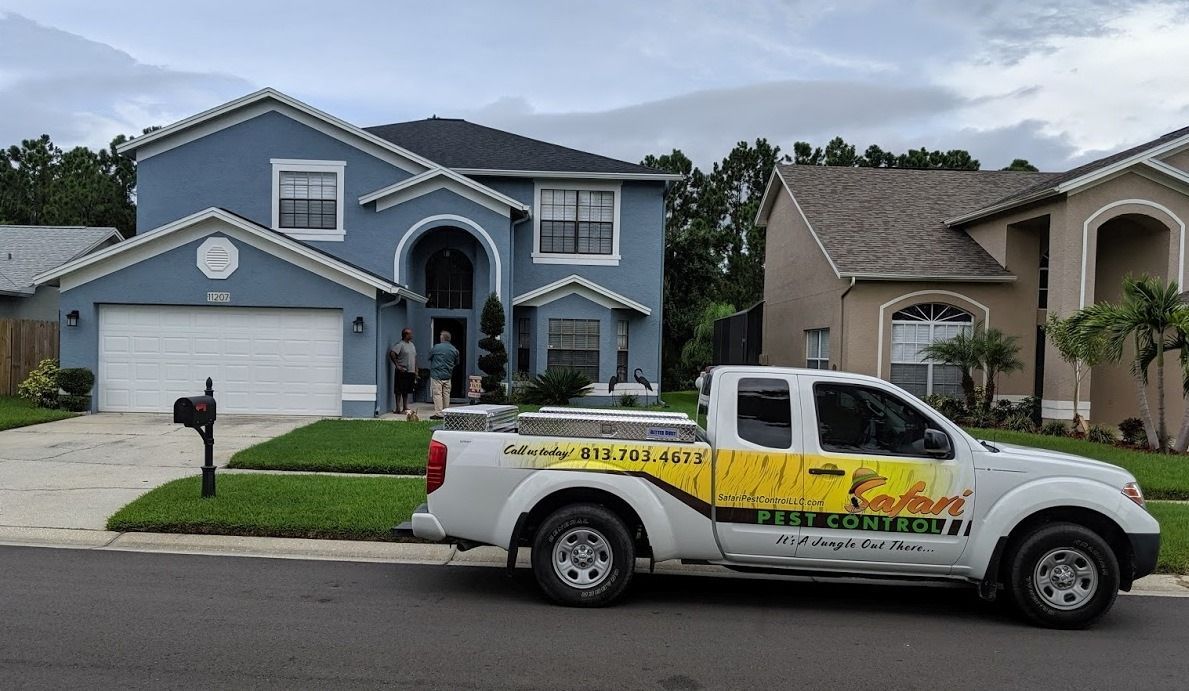 Pest control truck parked at a residential home Pest control truck parked at a residential home