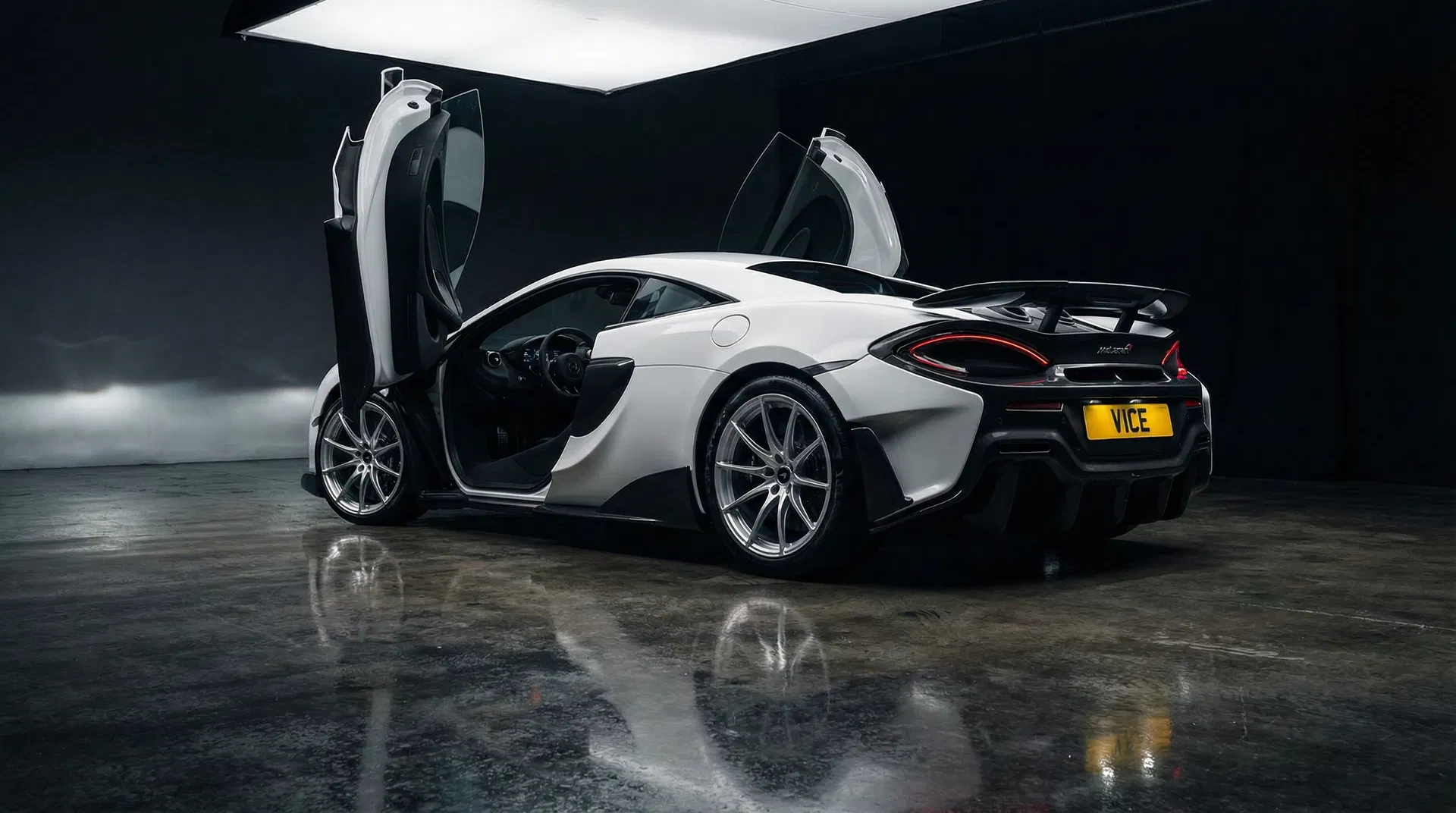 White McLaren 600LT with VICE number plate