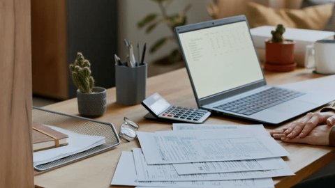 Travel documents and passport on a desk