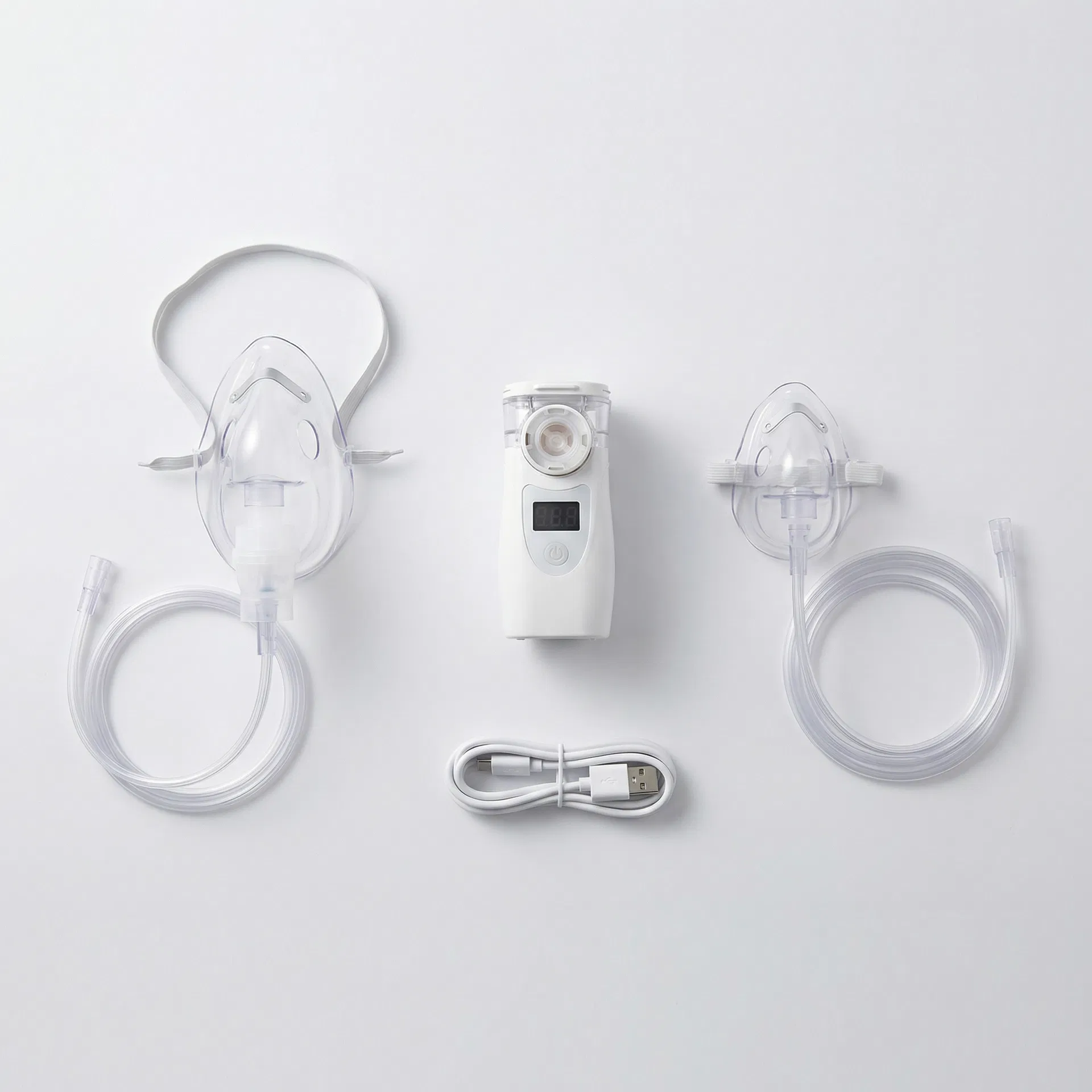 Complete nebulizer kit with adult mask, child mask, and USB cable