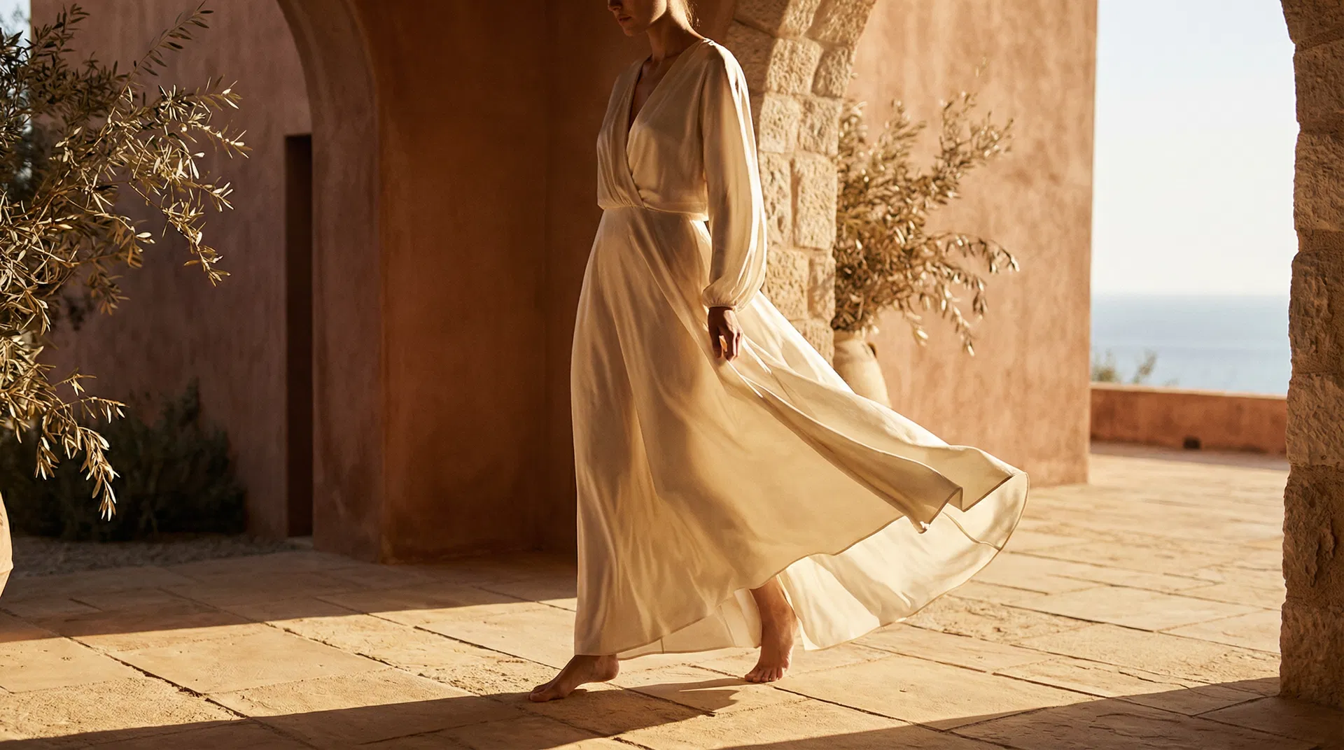 Woman in flowing silk dress