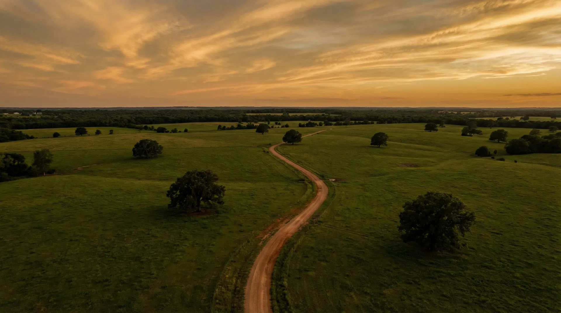 Aerial view of North Texas rolling prairie at golden hour