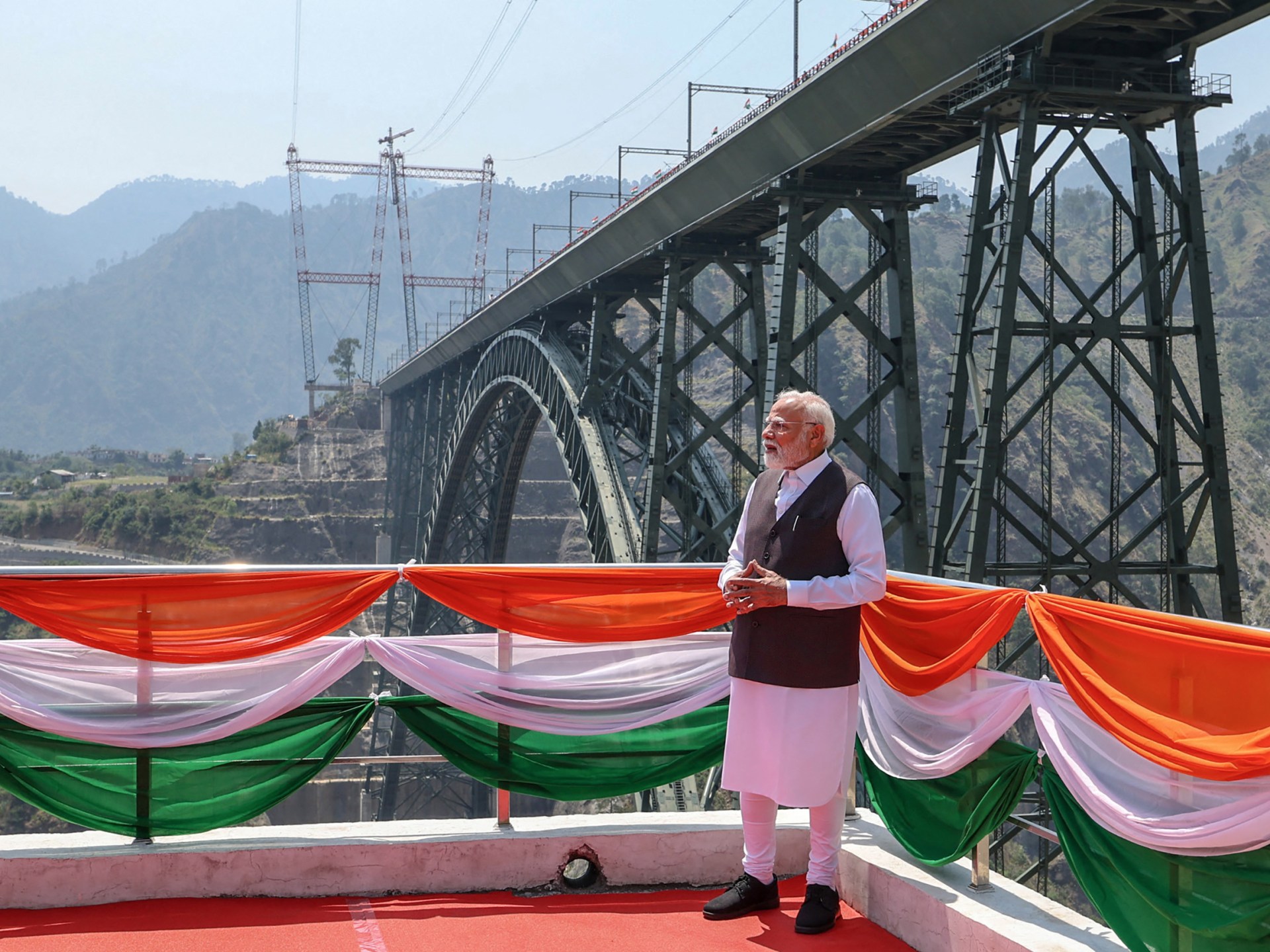 Vande Bharat Express train on a bridge in Kashmir.