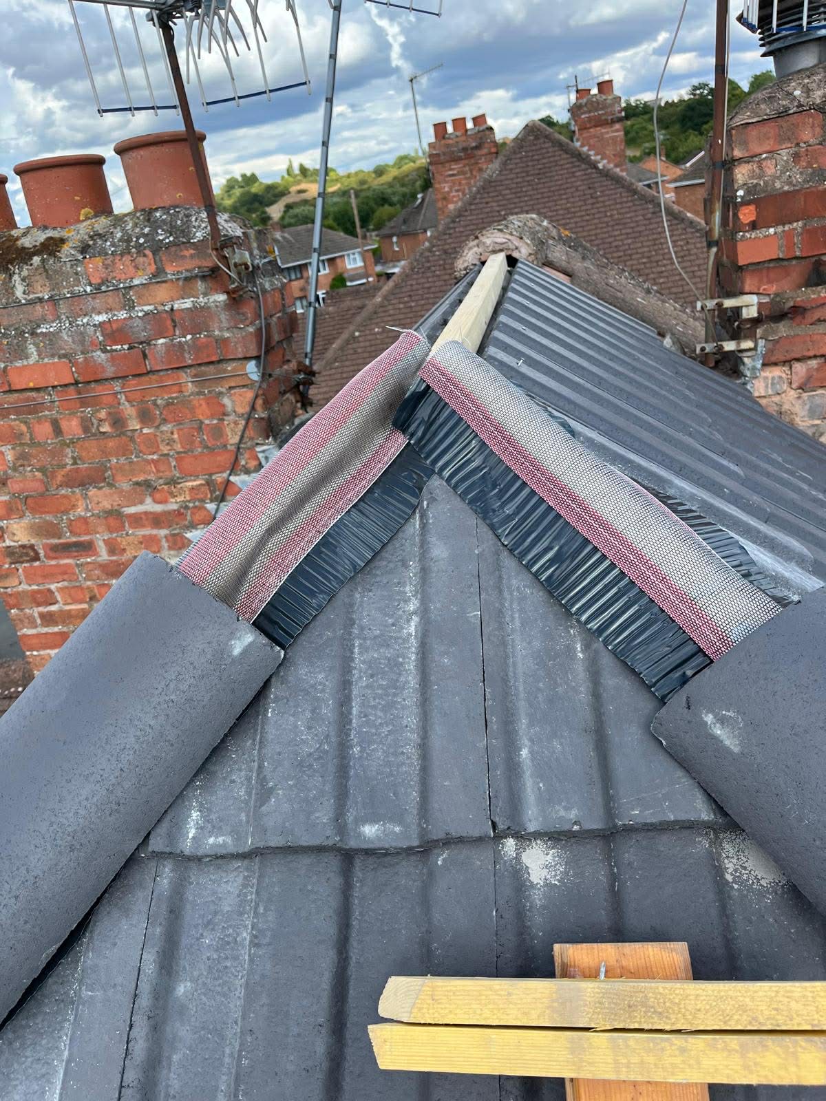 Scaffolding setup for roofing project in Bilston