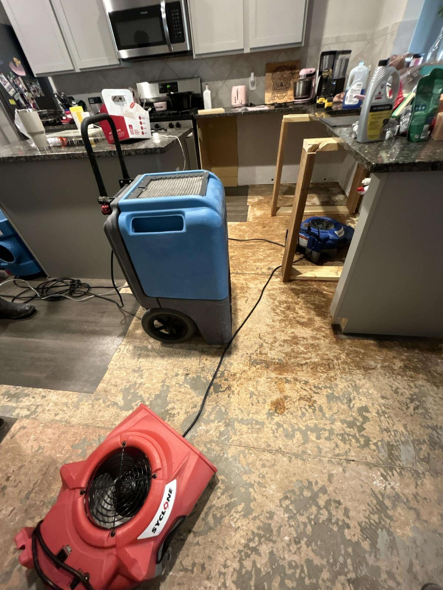 Water damage restoration — residential water extraction
