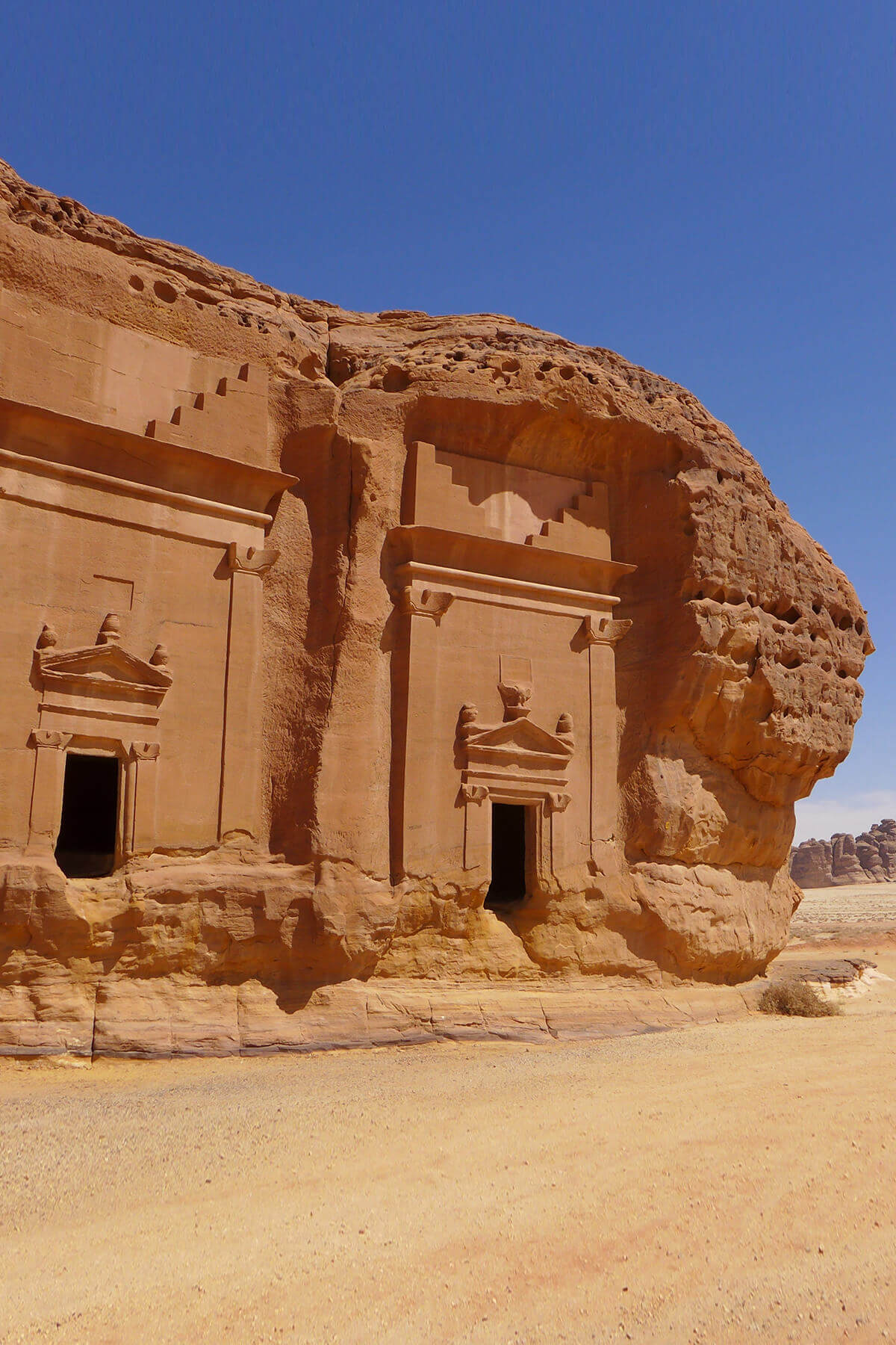 Hegra ancient tomb at sunset in AlUla