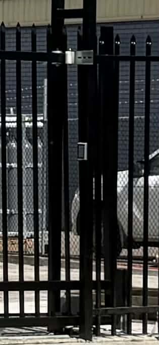 Industrial sliding gate installation by Bluey's Family Fencing