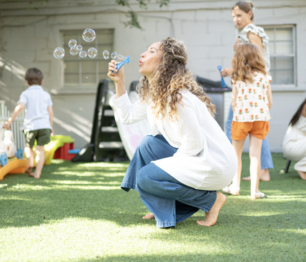Casey Carrington playing with children