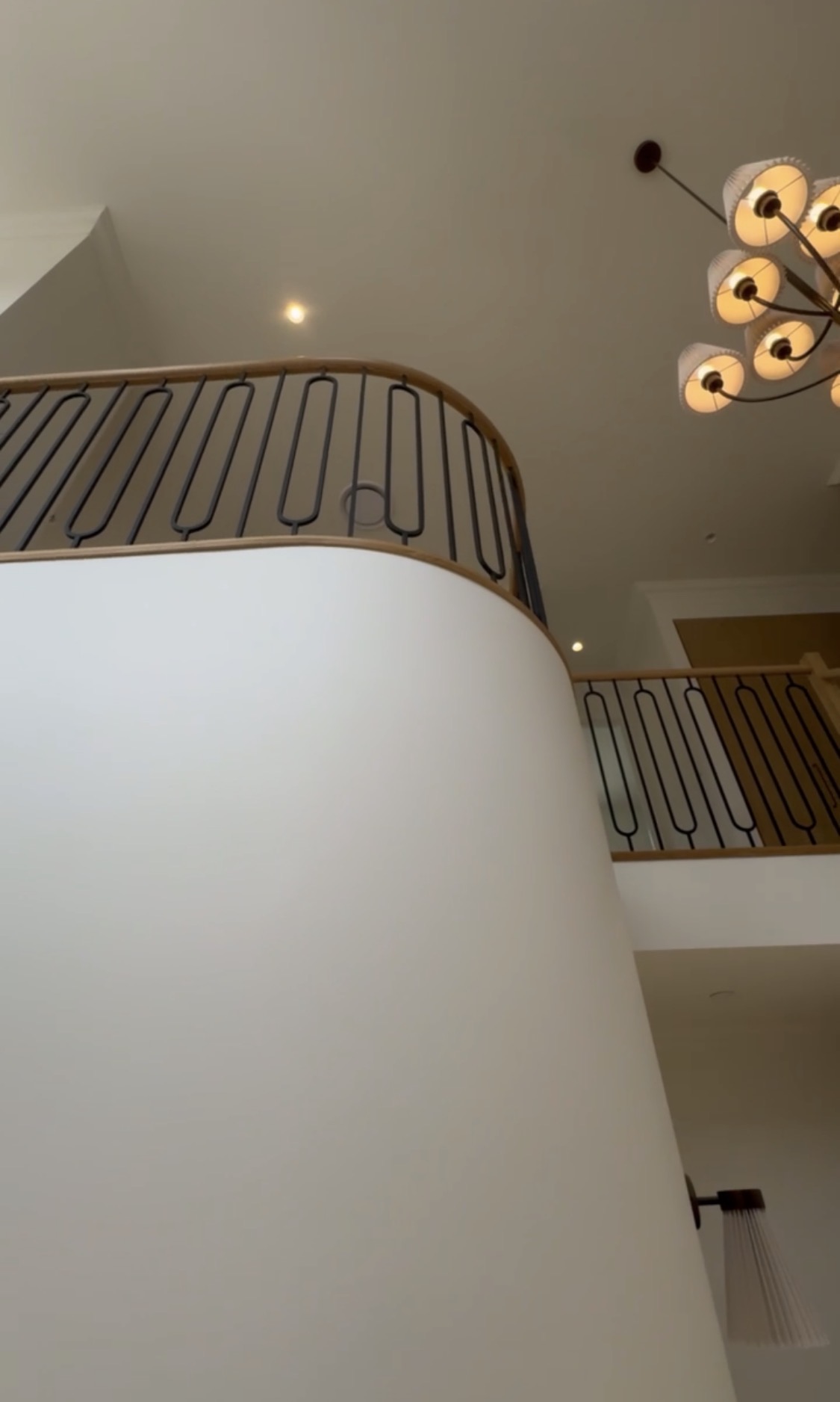 Double-Height Void & Curved Staircase