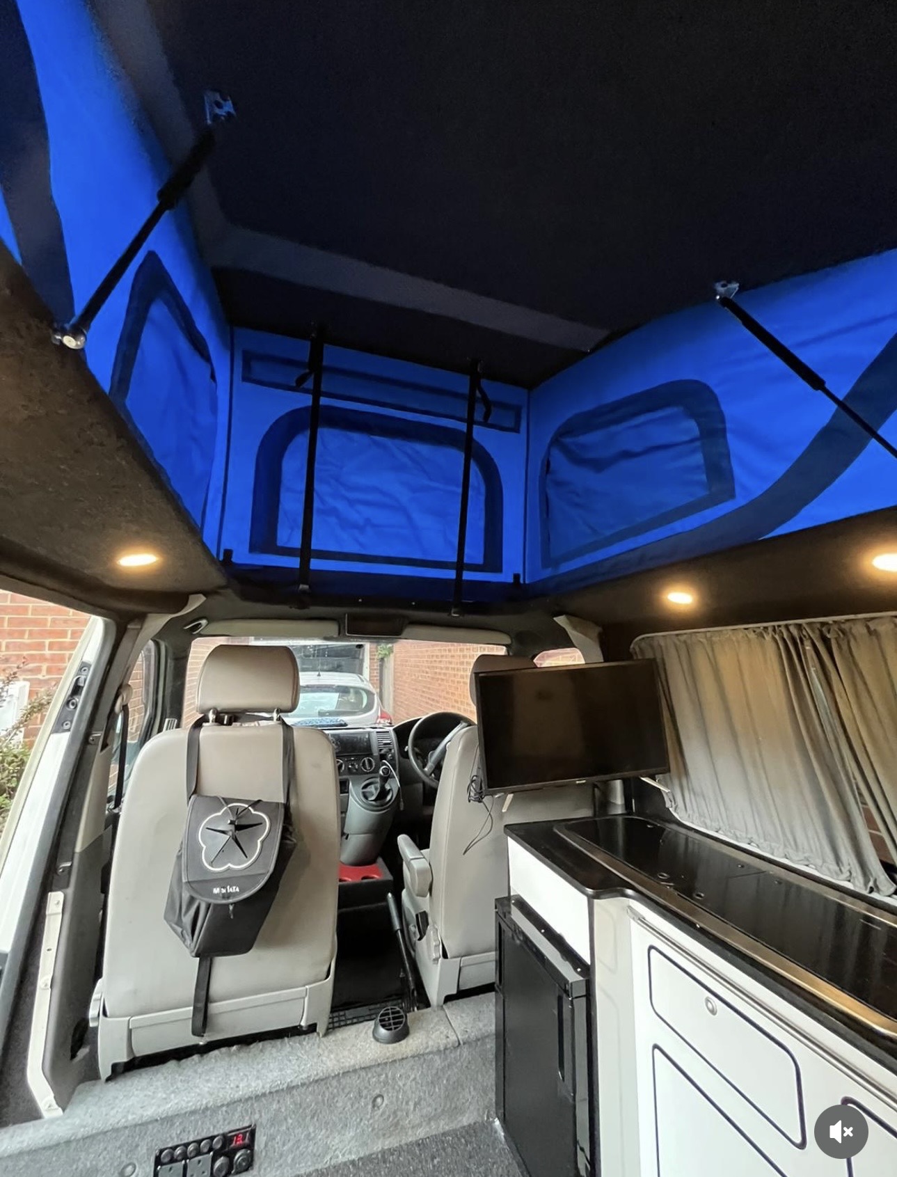 Plaid Bed & Wood Floor