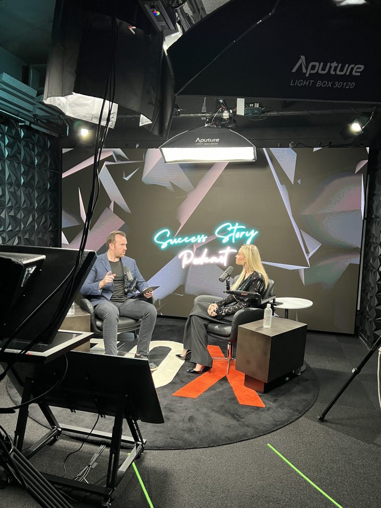 Scott D. Clary speaking on stage